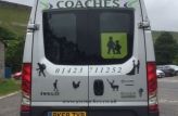 Rear of coach with silhouette graphics